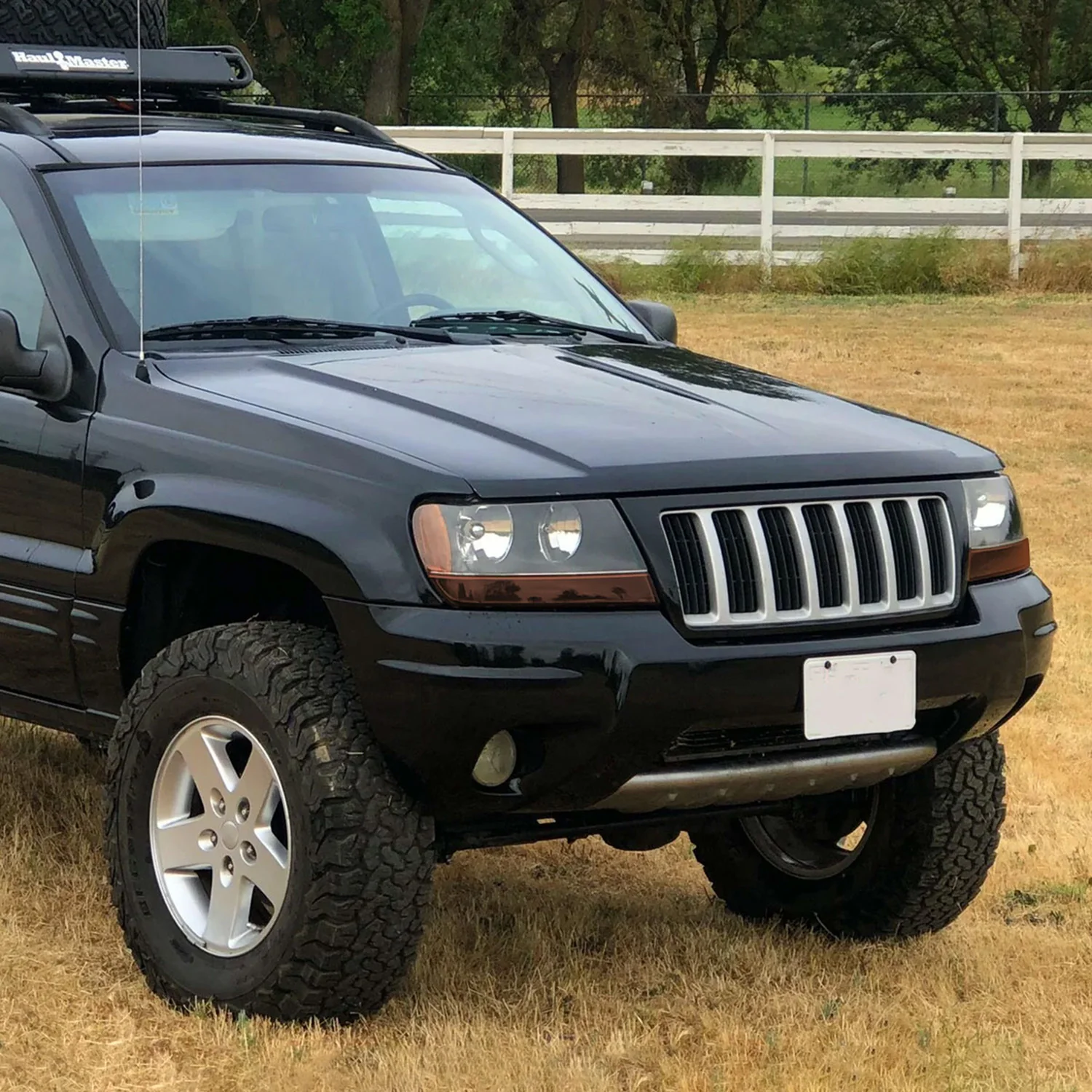 1999-2004 Jeep Grand Cherokee Factory Crystal Headlights Matt Black/Clear - Image 10